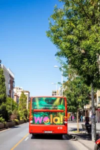 Publicidad de Wola en un bus en Granada